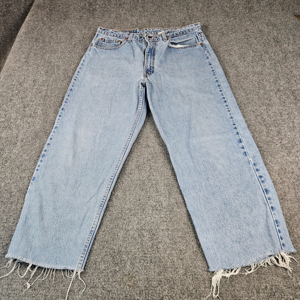 Vintage Levis 550 Relaxed Fit Jeans Made in USA Light Wash Raw Hem Cutoff